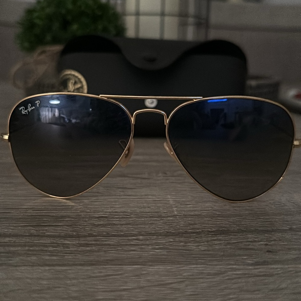 Ray-Ban Aviators. Gold trim, grayish-blue lens. Small